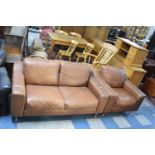 A Modern Leather Effect Suite Comprising Two Seater Settee and Armchair