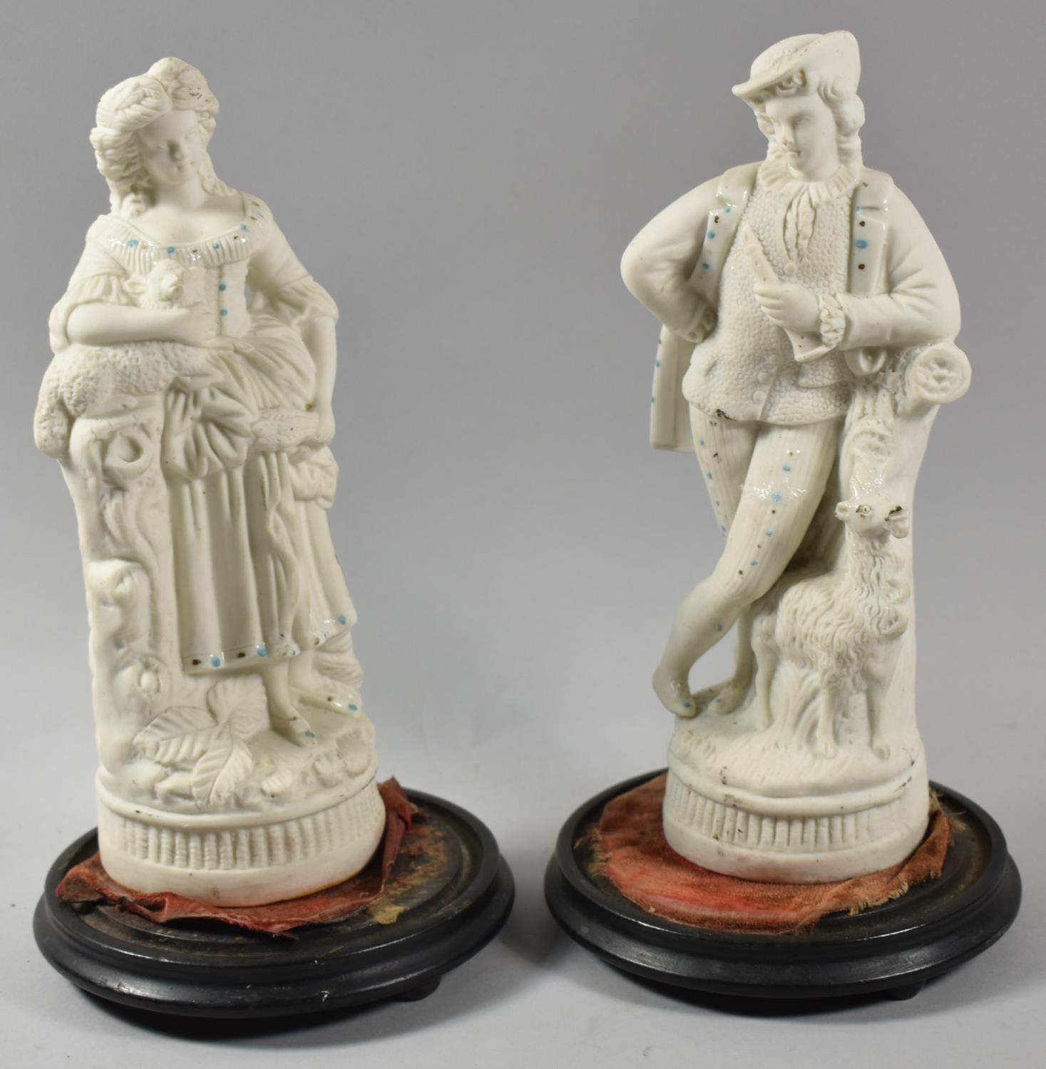 A Pair of Continental Bisque Figural Ornaments, "Shepherds", 26cm High
