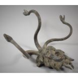 A Modern Cast Metal Bronze Effect Wall Hanging or Coat Rack in the Form of Medusa's Head with