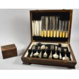 A Small Wooden Musical Box Together with an Oak Canteen Box Containing Unrelated Cutlery