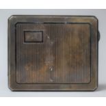 A Heavy Art Deco Silver Cigarette Case with Engine Turned Decoration and Monogrammed S.H.K and