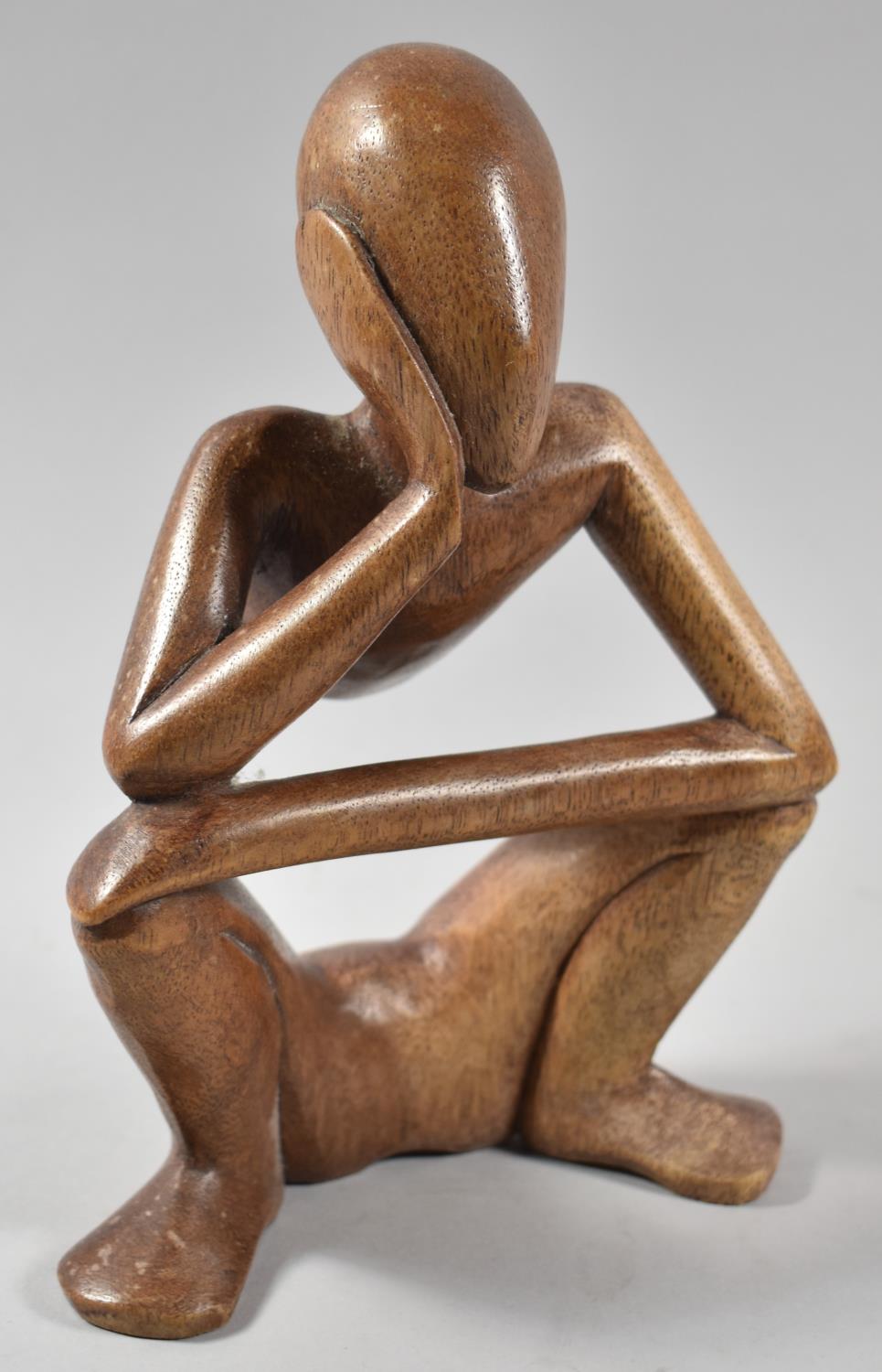 A Carved Wooden Modern Art Sculpture, The Thinker, 21.5cm high