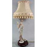 A Reproduction Figural Table Lamp in the Form of Flapper Girl with Parrot, Arm Glued, Complete