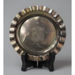 A Silver Circular Dish with Armorial Engraving, 'Forward', Birmingham 1975 by W.I. Broadway & Co.,