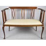 An Edwardian String Inlaid Mahogany Salon Settee on Cabriole Supports, 104cm wide