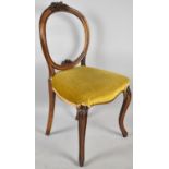 A Late Victorian Carved Walnut Framed Balloon Backed Side Chair on Front Cabriole Legs