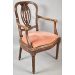 An Edwardian Serpentine Front Walnut Framed Armchair with Upholstered Pad Over Original Cane Base,