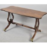 A Mid 20th Century Mahogany Coffee Table on Lyre Supports with Brass Claw Feet, 88cm Long