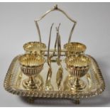 An Edwardian Silver Plated Boiled Egg Cruet for Four with Egg Cups and Spoons, Pierced Rim to