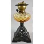 A Late Victorian Cast Iron Based Oil Lamp with Glass Reservoir, No Shade or Chimney