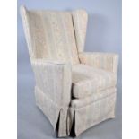 A Modern Upholstered Wing Armchair