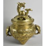 A 20th Century Bronze Chinese Cast Censer Set on Triform Supports Flanked by Elephant Handles with
