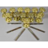 A Collection of Twelve Brass Furniture Knobs