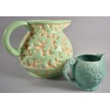 A Large Relief Decorated Jug Shape No.653 Together with a Small Arthur Woods Floral Decorated Jug