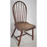 A Child's Spindle Back Chair with Paper Label Inscribed "Made in Pennsylvania, USA, March 1838 for