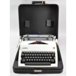 A Vintage Cased Olympia Portable Manual Typewriter