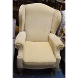 A Modern Upholstered Wing Armchair