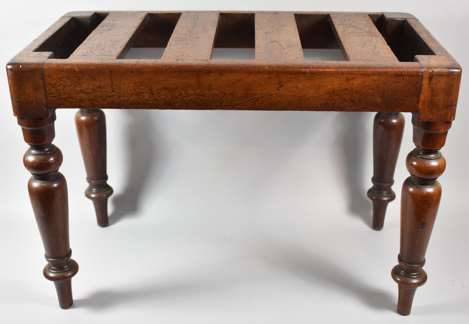 A Victorian Mahogany Luggage Stand on Turned Supports, 63cm wide