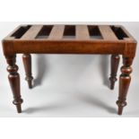 A Victorian Mahogany Luggage Stand on Turned Supports, 63cm wide