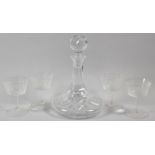 A Cut Glass Ships Decanter Together with Four Engraved Wine Glasses