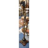 A French Style Gilt Metal and Marble Effect Standard Lamp with Cherub Decoration