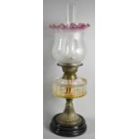 A Late Victorian Oil Lamp with Acid Etched Shade, Glass Reservoir and Brass Support, Complete with