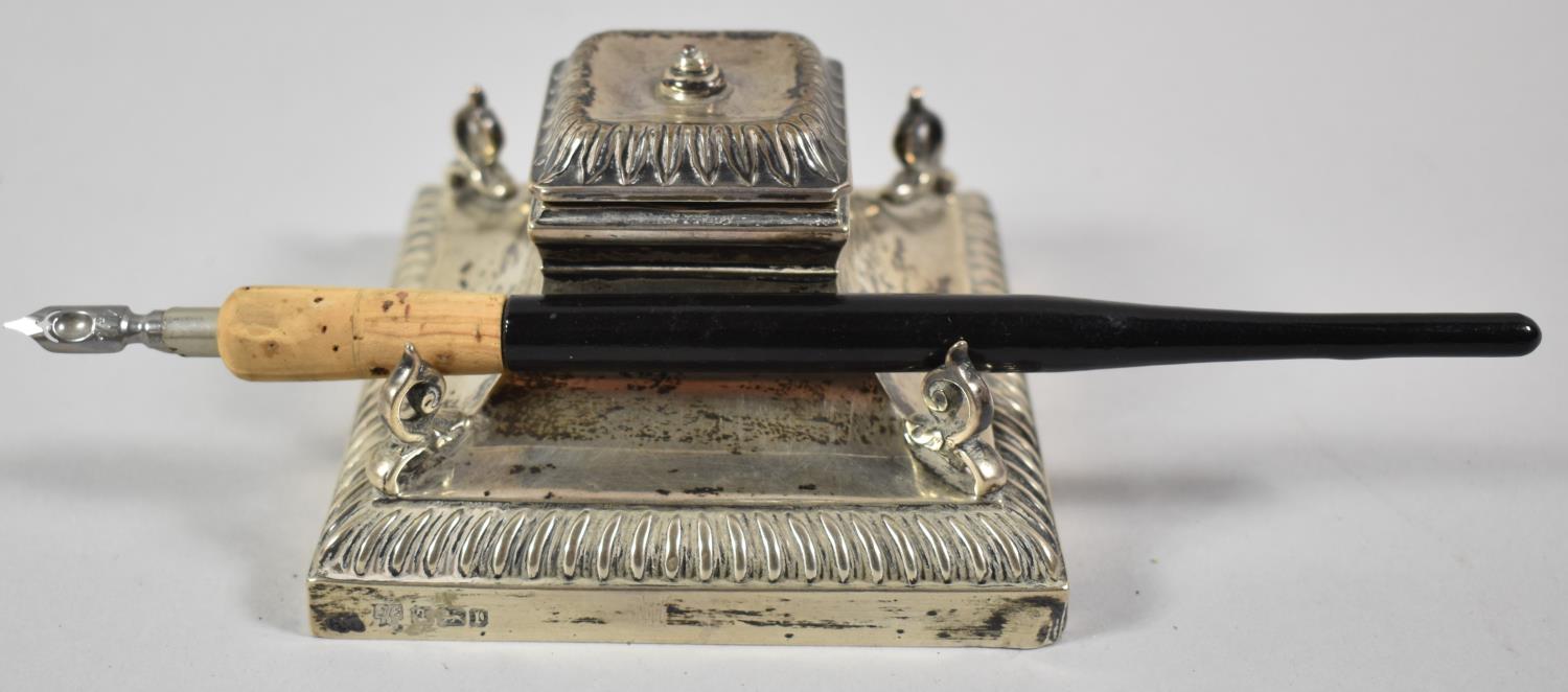 A Silver Desktop Inkwell with Four Scrolled Pen Rests and Glass Liner, With Unrelated Pen, 9.5cm