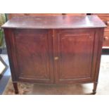 An Edwardian Mahogany Bow Fronted Side Cabinet with Panelled Doors to Shelved Interior