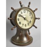 An American 1920's Brass Cased Ship's Wheel Clock by Waterbury Clock Company with Eight Day Jewelled