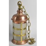 A Brass and Copper Hall Ceiling Lantern Light Fitting of Cylindrical Form with Opaque Glass Shade,