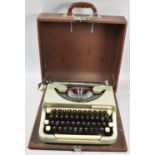 A Vintage Cased Imperial Good Companion Portable Manual Typewriter