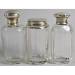 A Collection of Three Silver Lidded Glass Dressing Table Pots