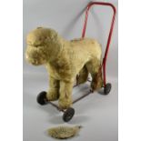 A Vintage Pedigree Child's Push Along Toy In the Form of a Dog, Worn and Ear Detached