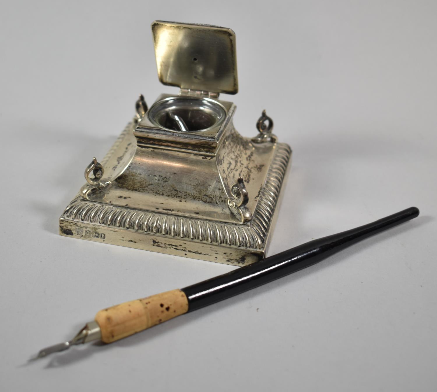 A Silver Desktop Inkwell with Four Scrolled Pen Rests and Glass Liner, With Unrelated Pen, 9.5cm - Image 2 of 3