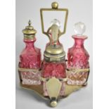 A Late 19th/Early 20th Century Four Bottle Cranberry Glass Cruet on Silver Plated Stand, Ball