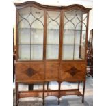 A Nice Quality Inverse Break Fronted Edwardian Walnut and Mahogany Display Cabinet with Shaped