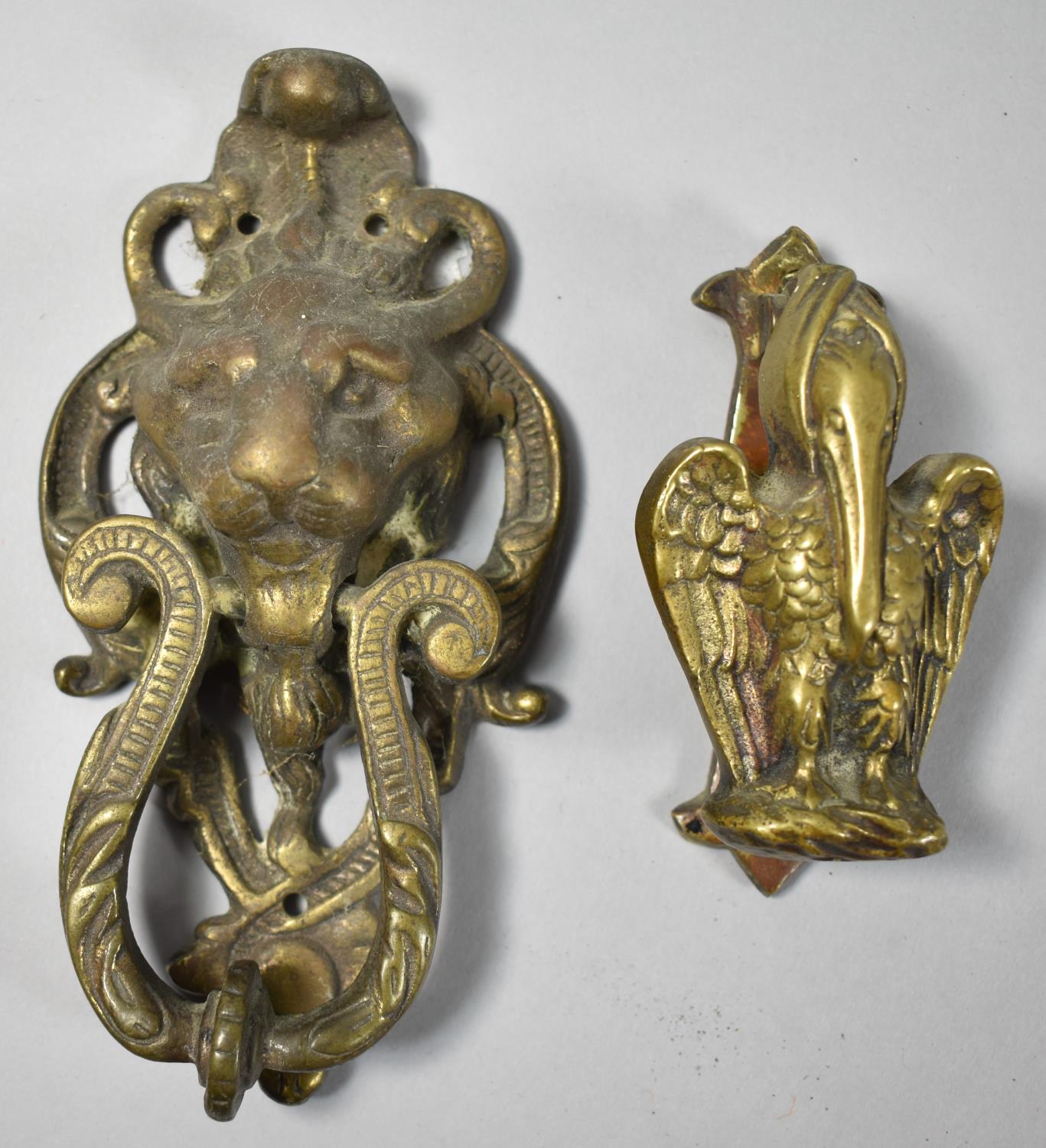 Two Brass Door Knockers, Pelican and Horned Lion