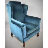 A Late Victorian/Edwardian Wing Armchair, Has Been Reupholstered Sometime Ago in Blue Velvet