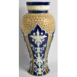 A Large Royal Doulton Stoneware Vase of Baluster Form Having Gilt Scrolled Motif Above Relief Blue