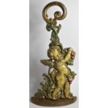 A 19th Century Painted Cast Iron Door Porter in the Form of a Cherub Carrying Grapes, 42cm High