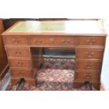 A Reproduction Mahogany Kneehole Desk with Tooled Leather Top, Long Centre Drawer Flanked by Four