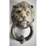 A Cast Iron Lion Mask and Ring Door Knocker, 18cm high