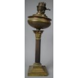 An Edwardian Brass Oil Lamp of Ribbed Corinthian Column Form on Square Stepped Base, 52.5cm high