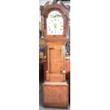 A 19th Century Oak and Mahogany Crossanded and Inlaid 30 Hour Long Case Clock with Arched Painted