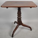 A 19th Century Mahogany Rectangular Snap Top Table on Tripod Support, 66x50cm
