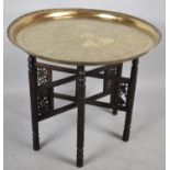 An Indian Brass Benares Tray Top Table, 69cm Diameter