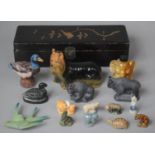 A Lacquered Oriental Box Containing Various Ceramic Animal and Bird Ornaments