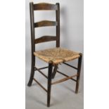 A Single Rush Seated Ladderback Side Chair for Restoration