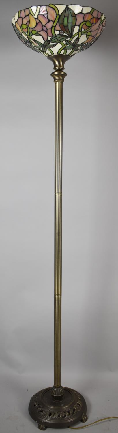 A Modern Uplighter with Reproduction Tiffany Style Shade