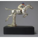 A Chromed Car Mascot in the Form of Racehorse and Jockey Taking Fence, 12.5cm high